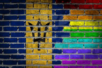 Dark brick wall texture - coutry flag and rainbow flag painted on wall - Barbados