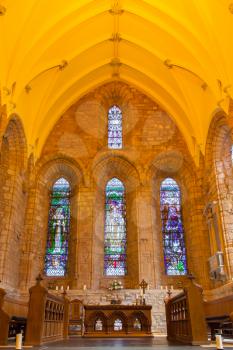 Dome of small Scottish cathedral, yellow lights