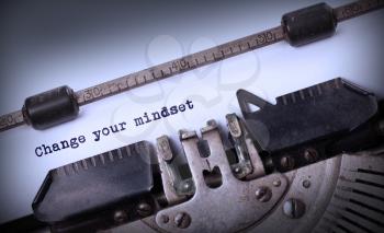 Vintage inscription made by old typewriter, Change your mindset