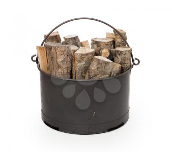 Metal basket of firewood, isolated on white
