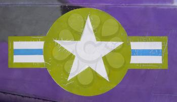 Tail of Vietnam war Airplane displayed in Saigon (Vietnam), green and purple