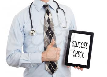 Doctor, isolated on white backgroun,  holding digital tablet - Glucose check