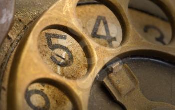 Close up of Vintage phone dial, dirty and scratched - 5, perspective