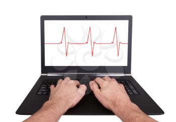 Man working on laptop, heartbeat, isolated
