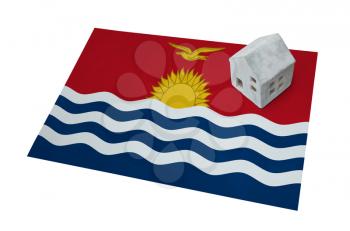 Small house on a flag - Living or migrating to Kiribati