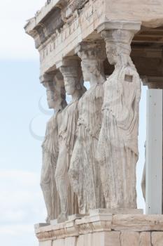 The caryatid statues on the porch of the Erechtheion at the Acropolis in Athens - Greece