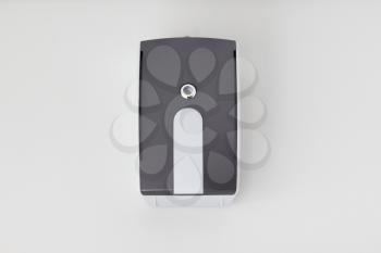 Wireless doorbell hanging on a white wall