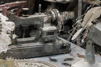 Sewing machine on table in workshop - Vintage setting