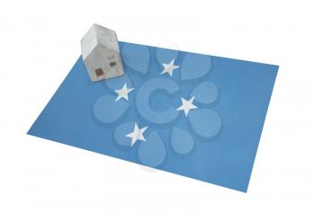 Small house on a flag - Living or migrating to Micronesia