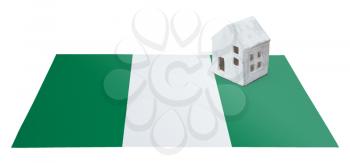 Small house on a flag - Living or migrating to Nigeria