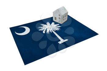 Small house on a flag - Living or migrating to South Carolina