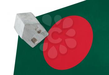 Small house on a flag - Living or migrating to Bangladesh