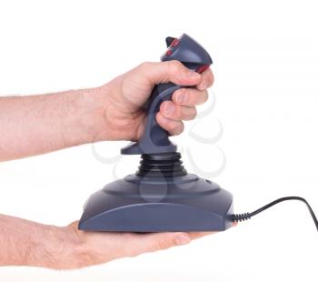 Hand holding gaming joystick, isolated on a white background