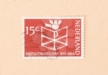THE NETHERLANDS 1960: A stamp printed in the Netherlands shows a bible, circa 1960