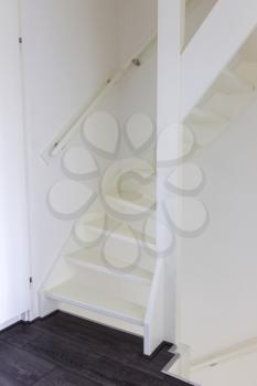 White wooden stairs - Going from upstairs to downstairs