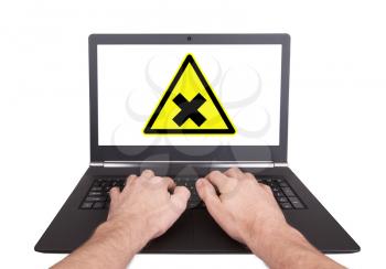 Man working on laptop, irritation, isolated