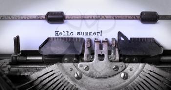 Vintage inscription made by old typewriter, Hello summer