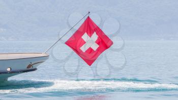 Ship with Swiss flag, lake Geneva, Switzerland
