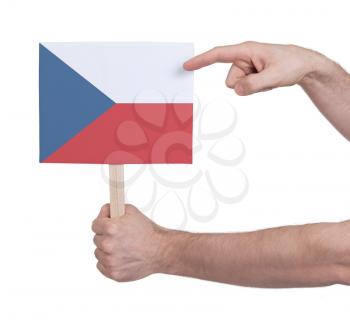 Hand holding small card, isolated on white - Flag of Czech Republic