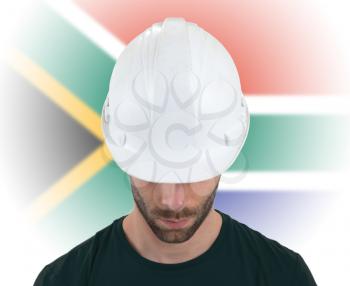 Isolated engineer with flag on background - South Africa