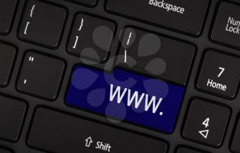 Blue www button on black keyboard background