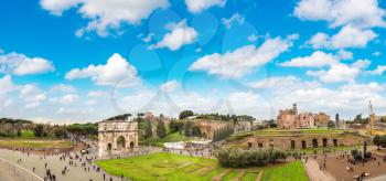 Arch of Constantine and Ancient ruins in Rome, Italy in a winter day