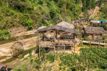 Water mill in Cat Cat village near Sapa, Lao Cai, Vietnam in a summer day