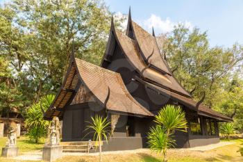 CHIANG RAI, THAILAND - MARCH 29, 2018: Baan Dam Museum (Black Temple) in Chiang Rai, Thailand in a summer day