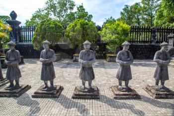 Tomb of Khai Dinh with Manadarin hnour guard in Hue, Vietnam in a summer day