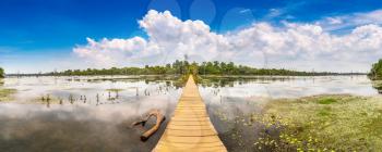 Panorama of Swamp in complex Angkor Wat in Siem Reap, Cambodia in a summer day