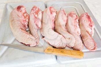 Photo of raw pork tongue in the market place