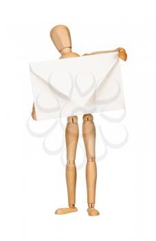 Wooden model dummy holding envelope, isolated on white. Mail concept.