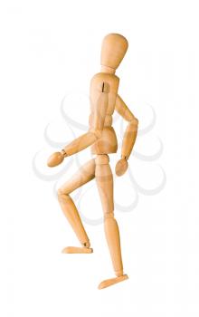 Wooden mannequin walking up invisible stairs isolated on white.