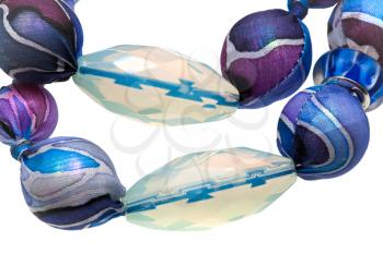 blue textile lady's bead with glass crystals isolated on white
