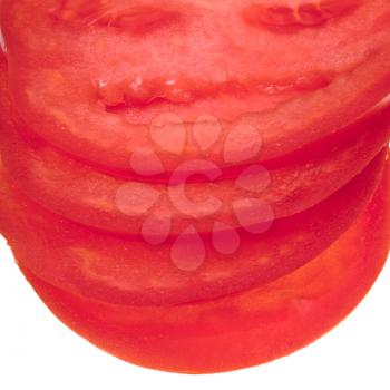 stack from sliced red tomato close up