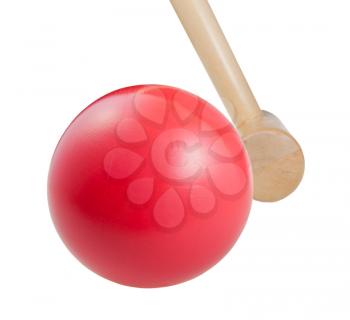 croquet red ball and wooden mallet close up isolated on white background