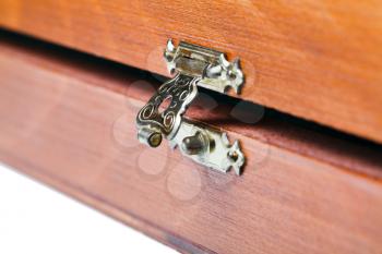 open metal lock of wooden box close up