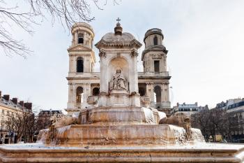 front view of of Saint-Sulpice fontain and church in Paris, France