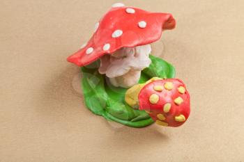 two plasticine mushrooms