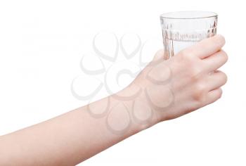 hand holds mineral water in glass isolated on white background