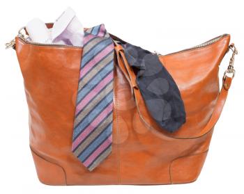 men's leather bag with shirt, tie, sock isolated on white background