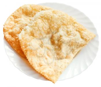 cheburek pie on white plate isolated on white background