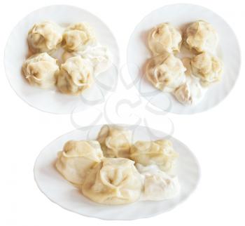 three plates with manti dumpling isolated on white background