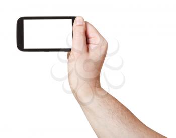 male hand holds smart phone with cut out screen isolated on white background