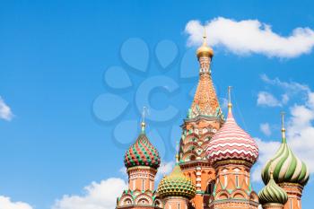 Saint Basil cathedral on Red Square in Moscow and blue sky with white clouds in sunny summer day