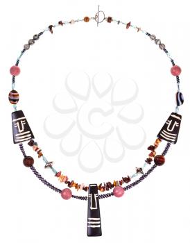 african style necklace from natural gemstones ( mookaite, jasper, rhodonite, agate) and carved bone and beads isolated on white background
