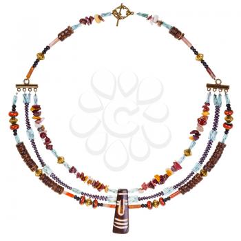 african style necklace from natural gems tones (mookaite, jasper), carved bone and coconut, glass beads, brass balls on white background