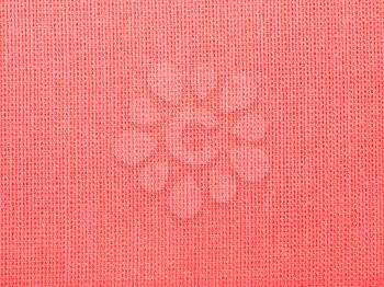 textile background - red silk batiste cloth with weave pattern of threads close up