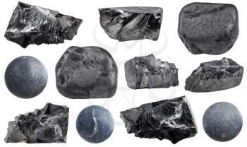 set of various shungite natural mineral stones and gemstones isolated on white background