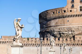 travel to Italy - statues of Angels on bridge Ponte Sant Angelo near the Castel in Rome city